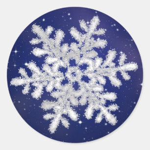 Glittering silver white snowflake on night sky classic round sticker