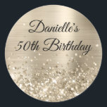 Glittery Champagne Foil 50th Birthday Classic Round Sticker<br><div class="desc">Create your own fancy monogram stylish milestone birthday celebration envelope seals for her. The background features a pale gold brushed metal style foil digital art graphic. Along the bottom is a band of gold faux glitter girly glam. Customise the font colour, size or style. The luxury sparkles, glitter and foil...</div>