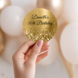 Glittery Gold Foil 50th Birthday Classic Round Sticker<br><div class="desc">Create your own fancy monogram stylish milestone birthday celebration envelope seals for her. The background features a golden yellow ombre brushed metal style foil digital art graphic. Along the bottom is a band of gold faux glitter girly glam. Customise the font colour, size or style. The luxury sparkles, glitter and...</div>