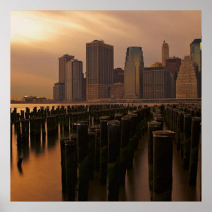 Glow of sunset during stormy skies over East Poster