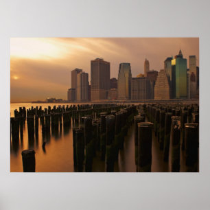 Glow of sunset during stormy skies over East Poster