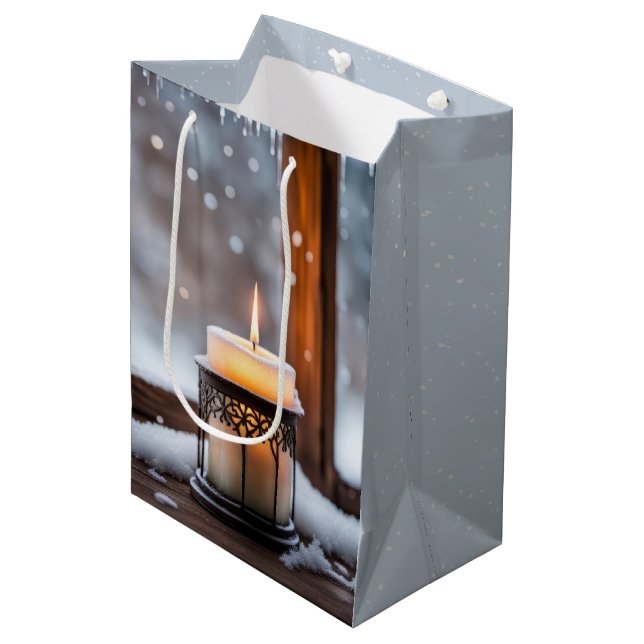 Glowing Christmas Candle In Snow Medium Gift Bag (Front Angled)