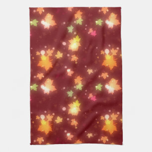 Glowing fall colourful maple leaf brown orange  tea towel