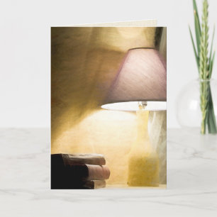 glowing lamp with old books impressionism card