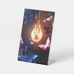 Glowing Light Bulb with Night Butterflies Pedestal Sign