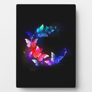 Glowing Neon Night Butterflies on Black background Plaque