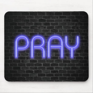 glowing neon PRAY sign on brick Mouse Mat