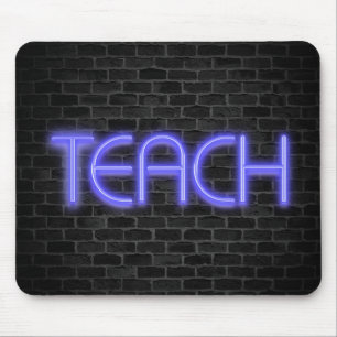 glowing neon TEACH sign on brick Mouse Mat