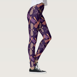 Glowing night dragonflies on dark plum background leggings