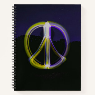 Glowing Peace Sign in Night Sky Mountains Notebook