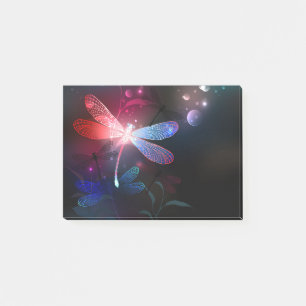 Glowing red dragonfly post-it notes