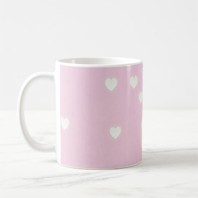 Glowing white hearts on pink coffee mug (Left)