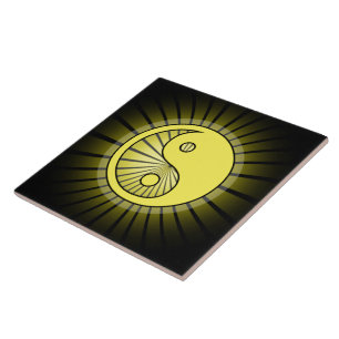 Glowing Yellow Yin Yang over Black Tile