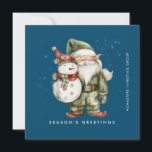 Gnome and Snowman Season's Greetings Business Flat Holiday Card<br><div class="desc">A gnome dressed in green stands beside a snowman in a red elf stocking hat and red scarf. They are surrounded by a dusting of white snow that pops on the dark blue background. The minimalist aesthetic is created with a simple Season's Greetings below and the business name running perpendicular...</div>