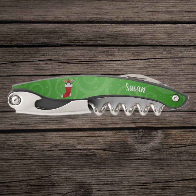 Gnome in Stocking Candy Canes Fancy Green Swirls Corkscrew (Cute gnome red hat inside red Christmas stocking with candy canes on green swirls corkscrew.)