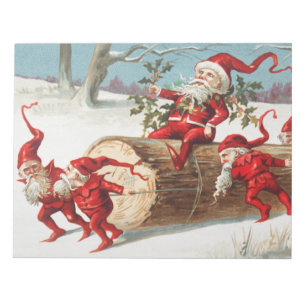 Gnomes dragging a cut tree trunk through the snow notepad