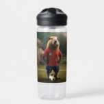 "Goal-Scoring Capybara: The Ultimate Soccer Star!" Water Bottle<br><div class="desc">"Soccer Capybara: Ready to Play", a spirited capybara is all set for the game, dressed in a bright soccer outfit complete with a team jersey and shorts. A soccer ball at its feet. The capybara stands poised on the field, surrounded by green grass and the excitement of the match. The...</div>