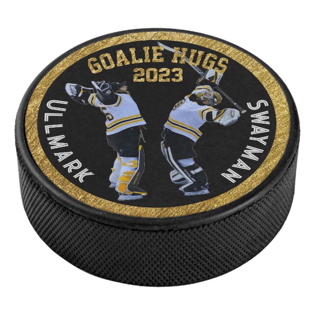 Goalie Hugs Hockey Puck (3/4)