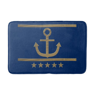 gold anchor on navy blue background bath mat