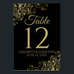 Gold and Black Elegant Filigree Wedding Table Number<br><div class="desc">Make your wedding reception beautiful with these table number cards. They feature a simple yet elegant design with gold text on a black background with a frilly gold faux foil floral filigree in the corners.</div>