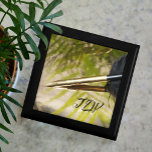 Gold and Black Feather Quill Pen wooden keepsake Gift Box<br><div class="desc">This wooden jewellery keepsake box with gold and black feather quill fountain pen reflected against a gold and green background is an ideal gift for the writer in your life. Personalise with initials, it is a unique gift to be treasured for keeping jewellery, keepsakes or treasures inside. A sophisticated style,...</div>