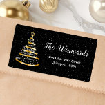 Gold and Black Ribbon Christmas Tree Label<br><div class="desc">This elegant and chic address label features a gold and black ribbon Christmas tree with a star topper. The text combines handwritten script and modern sans serif fonts for a classy and sophisticated look. The falling snow, snowflakes and sparkles give a festive and magical touch. This is perfect for Christmas...</div>