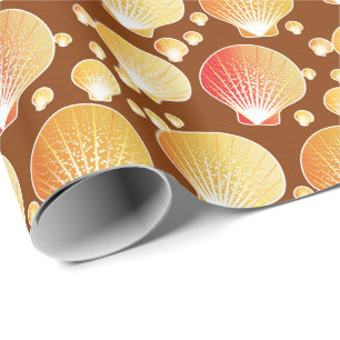 Gold and coral seashells on coffee brown wrapping paper