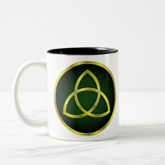 gold and green triquetra Two-Tone coffee mug (Left)