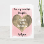 Gold and Pink 13th Birthday Daughter Card<br><div class="desc">A pretty pink and gold 13th birthday daughter card that features a beautiful gold heart against a pretty pink watercolor, which you can personalise underneath the heart with her name. The inside of this 13th birthday card reads a sweet sentiment for your daughter, which an be easily personalised. The back...</div>