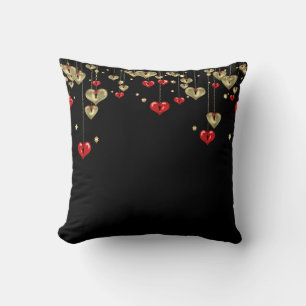 Gold and red hearts on black background cushion