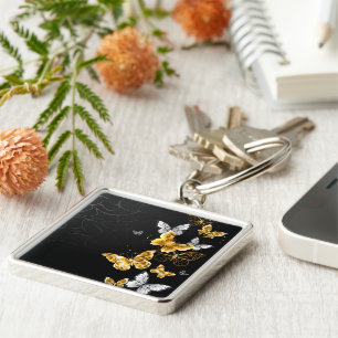 Gold and white butterflies key ring