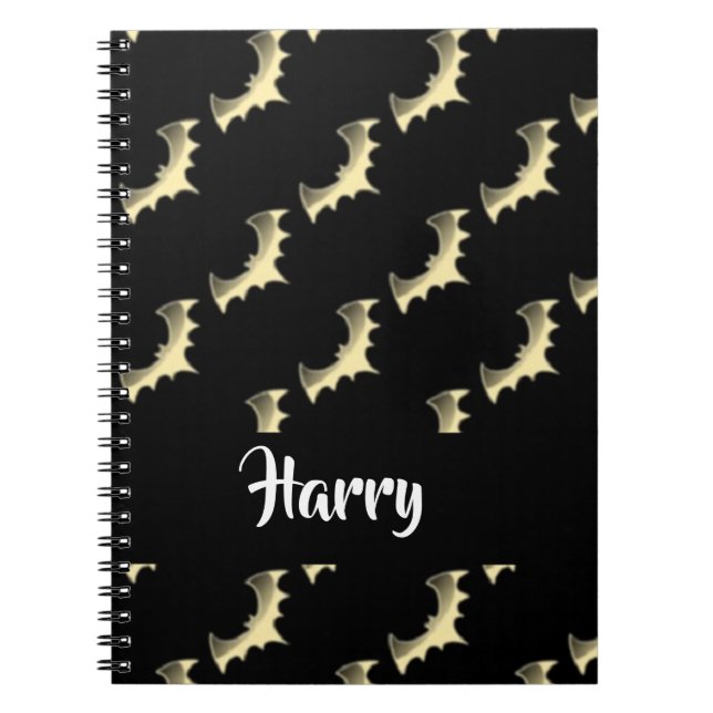 Gold bats on black notebook (Front)