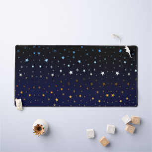 Gold, blue and white stars on dark blue sky desk mat