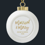 Gold Brush Script Married & Merry Wedding Ceramic Ball Christmas Ornament<br><div class="desc">Gold Modern Brush Script Married & Merry Wedding Ceramic Ornament</div>