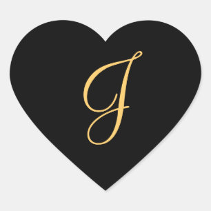 Gold-coloured initial J on black monogram sticker