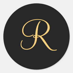 Gold-coloured initial R on black monogram sticker