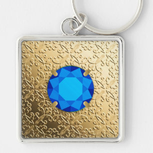 Gold Damask with a faux sapphire gemstone Key Ring