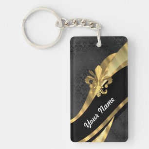 Gold fleur de lys on black key ring