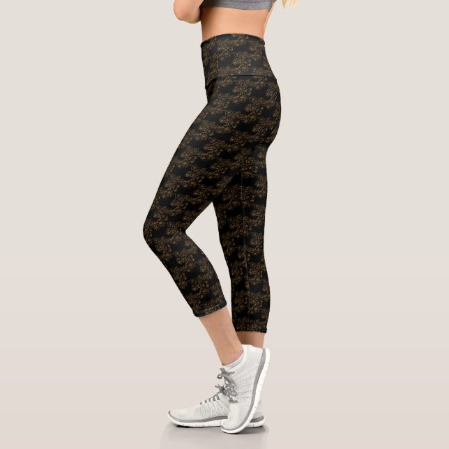 Gold Floral Design On Black   Capri Leggings (Left)