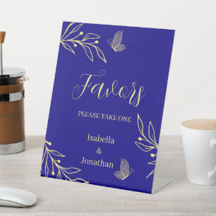 gold floral royal blue wedding favours table  pedestal sign