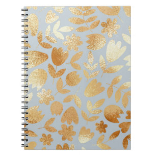Gold flowers, blue background, foil imitation. notebook