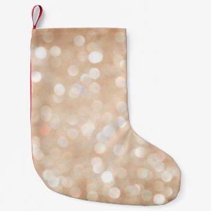 Gold glitter blurred background, christmas small christmas stocking