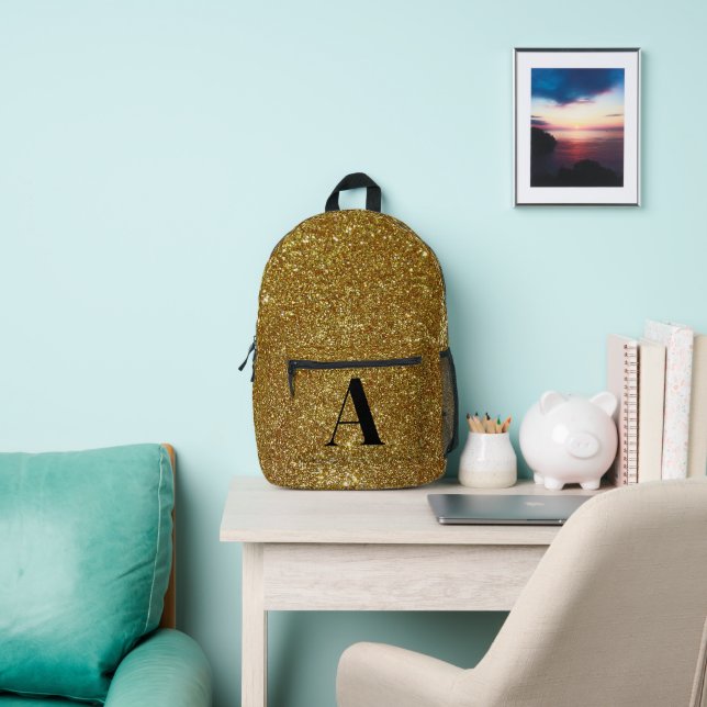 Gold glitter monogram printed backpack (Insitu)