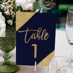 Gold glitter script navy blue table number