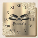 Gold Glitter Sparkle Eyelashes Monogram Name Square Wall Clock<br><div class="desc">Gold Faux Foil Metallic Sparkle Glitter Brushed Metal Monogram Name and Initial Eyelashes (Lashes),  Eyelash Extensions and Eyes cute wall clock. The design makes the perfect sweet 16 birthday,  wedding,  bridal shower,  anniversary,  baby shower or bachelorette party gift for someone looking for a trendy cool style.</div>