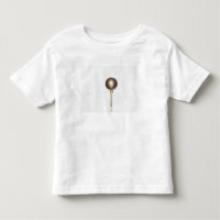 Gold golf ball and tee