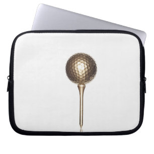 Gold golf ball and tee laptop sleeve