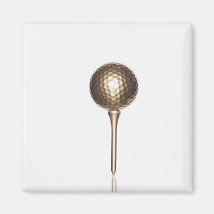 Gold golf ball and tee magnet