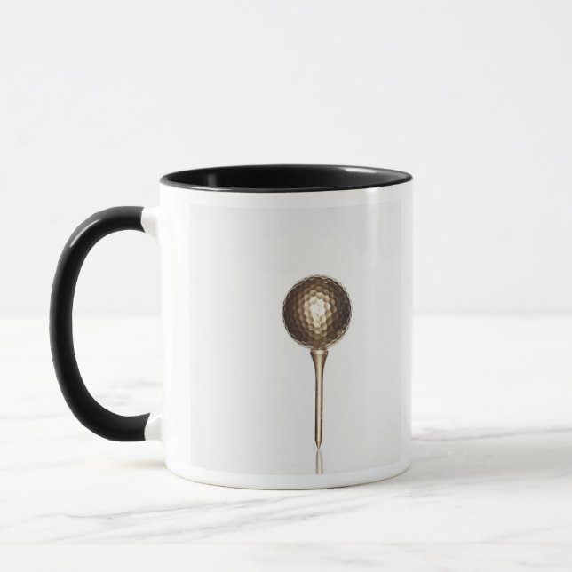 Gold golf ball and tee mug (Left)