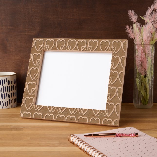 Gold hearts on maroon etched frames (Left)